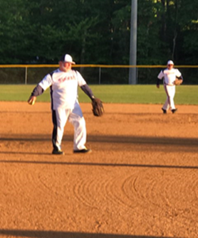 softball player pitching